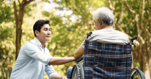 home care professional with a senior on wheel chair