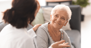 Caregiver at home with a senior